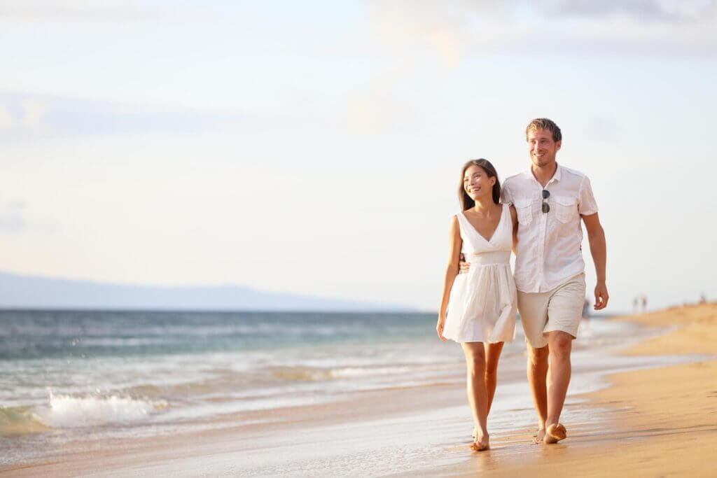 couple walking along the seashore