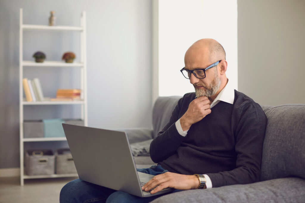 aged man communicates online